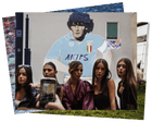 Maradona mural poses and a piglet race: photos of the day – Wednesday