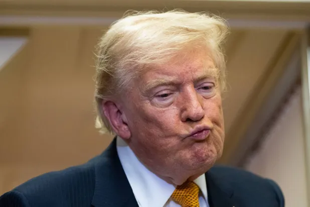 Trump threatens to 'totally destroy Iran' if it tries to assassinate him