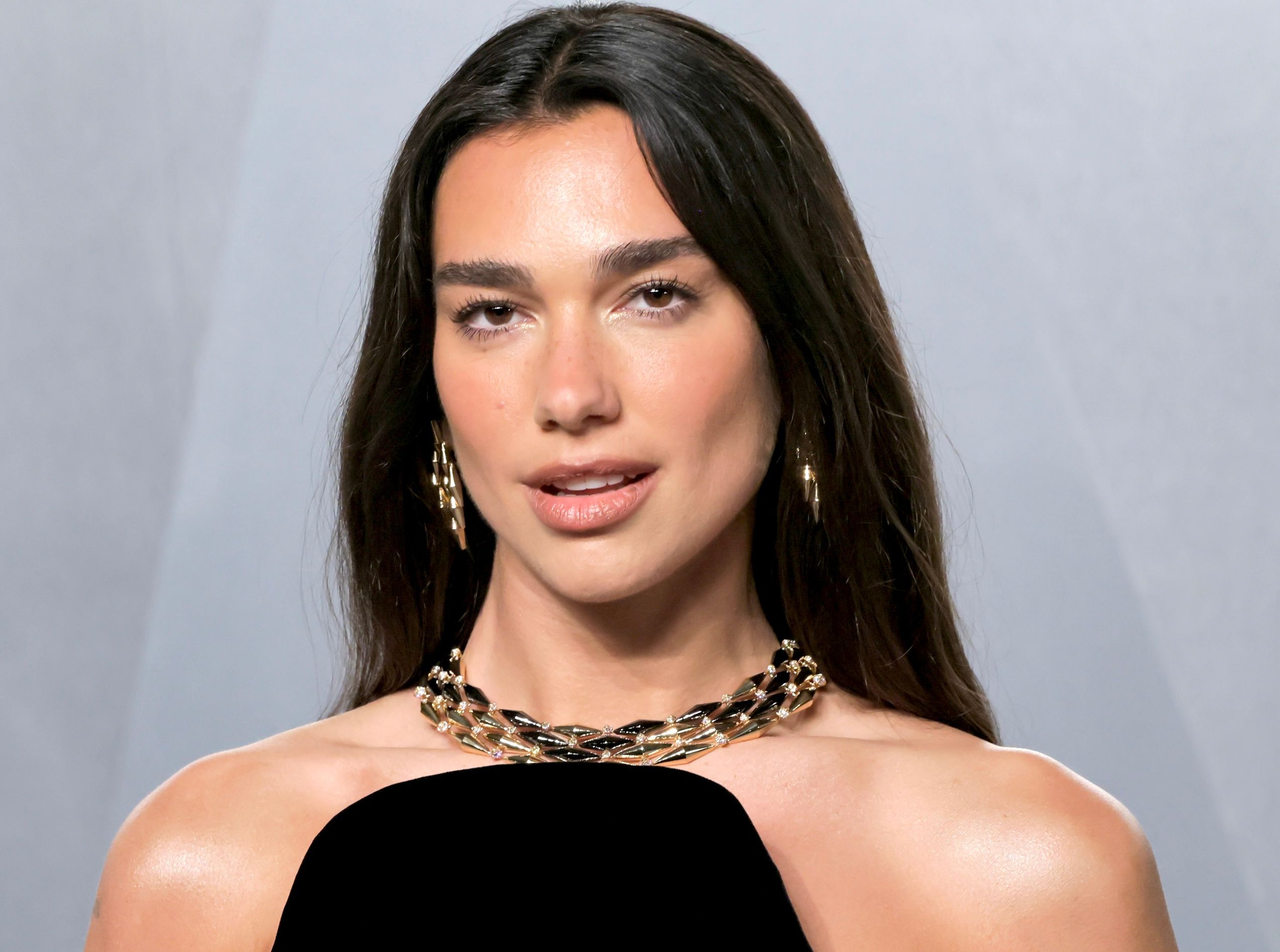 Dua Lipa Is Having a Headscarf Honeymoon — See Photos