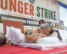 ‘I’m sorry but I’m unable to speak’: hero of India’s Cockroach party weakens on 19th day of hunger strike
