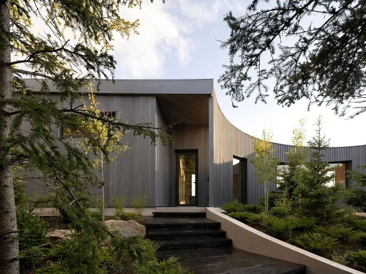 Architectural Design Exploring Spatial Duality in Cut Out House and the Mountain Context