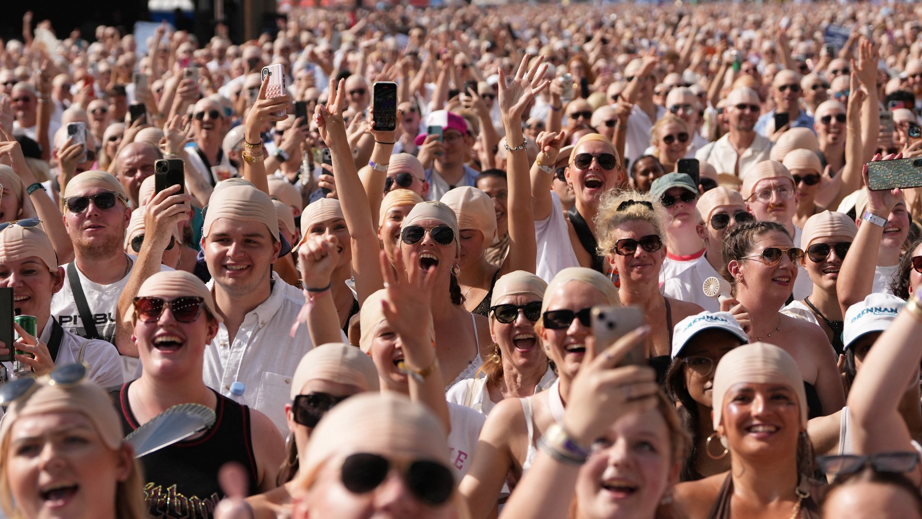 Pitbull Sets Guinness World Record for Most ‘Bald Caps’ at London Festival