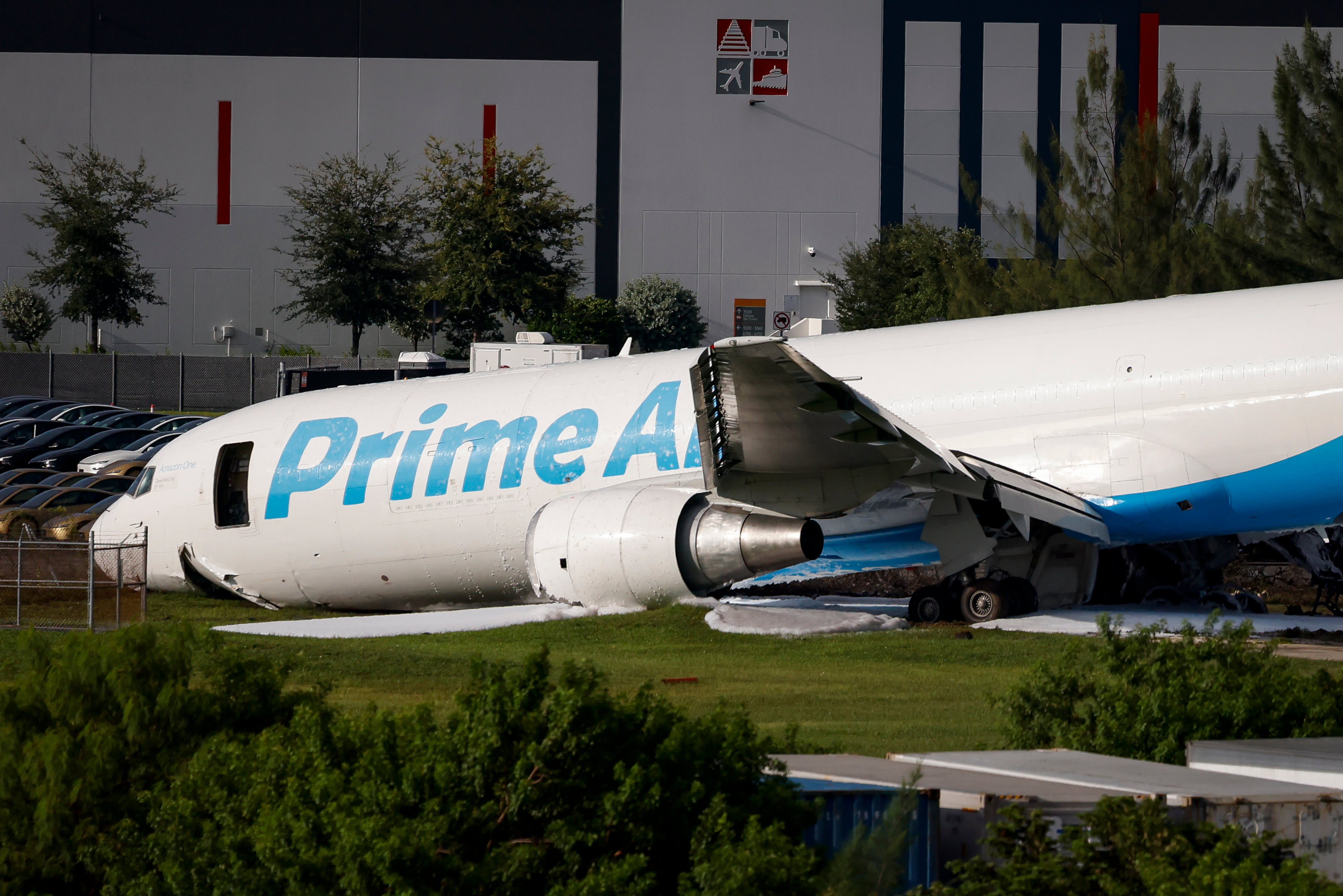 Crashed Amazon cargo jet struck two vehicles, ended up 1,300 feet past runway, NTSB says