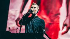 Massive Attack banned from Singapore after pro-Palestine display at show