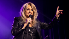 Bonnie Tyler out of coma but remains 'very unwell' after emergency surgery